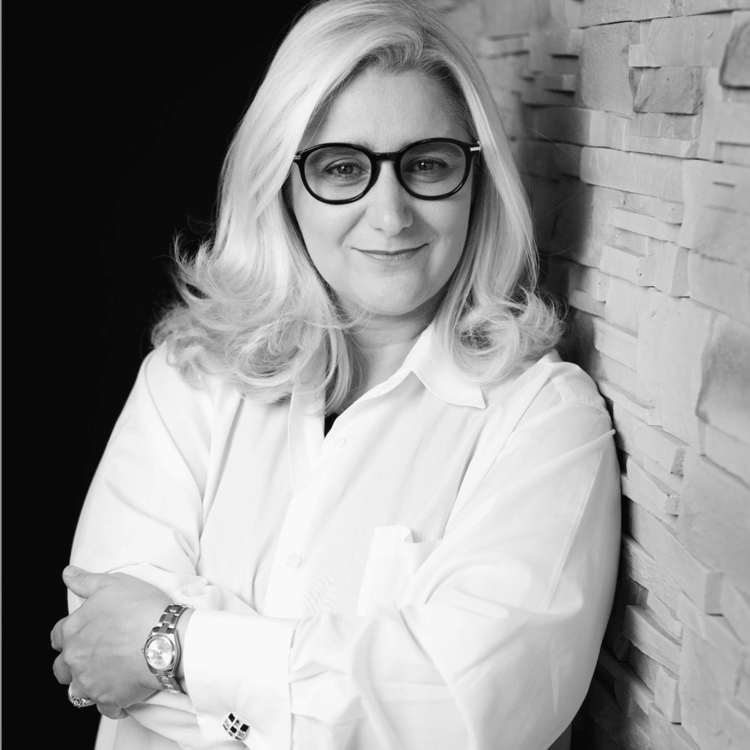 Nathalie Cooper, founder of Linkk Search, executive career coach — black and white portrait.